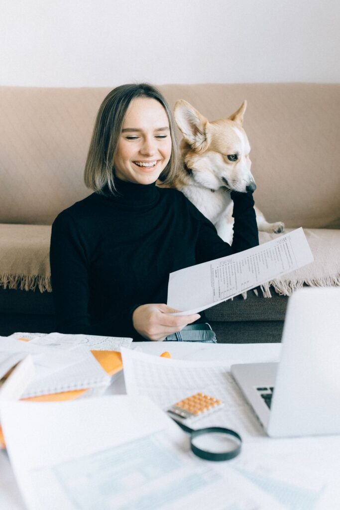 Dog and paperwork, related to how to compare pet insurance plans