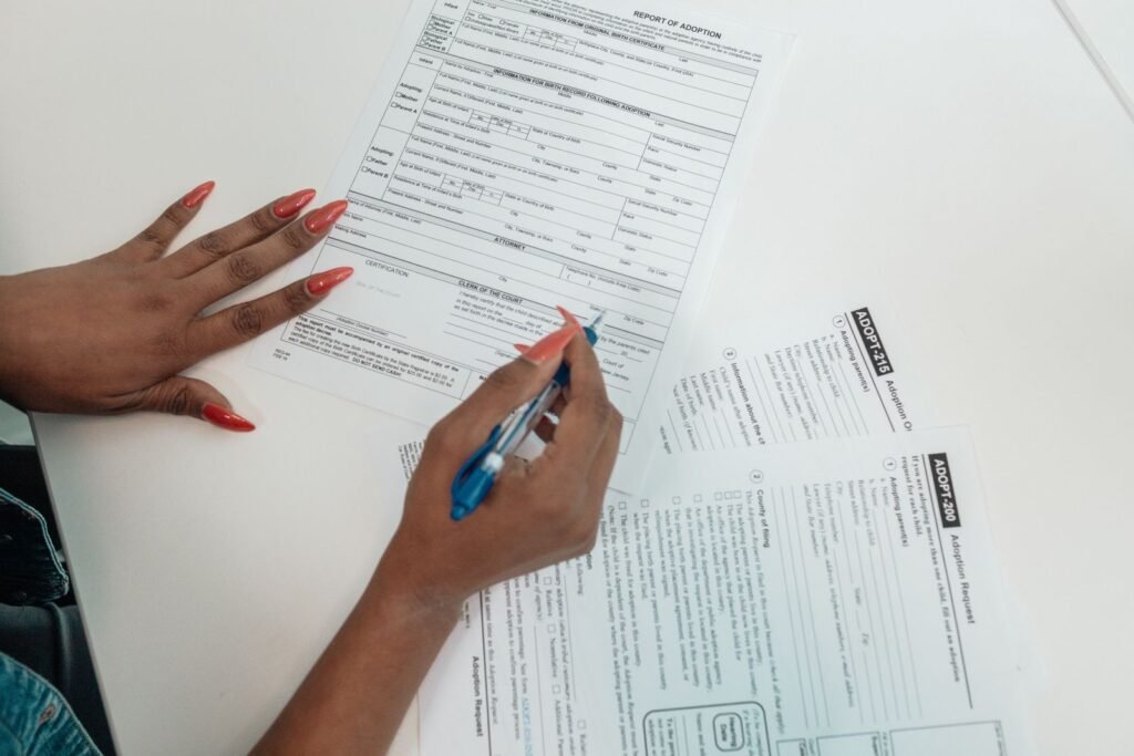 Person filling form, related to how to file a pet insurance claim